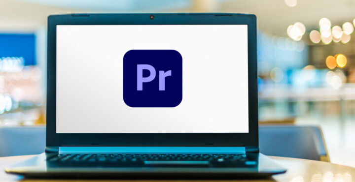 Laptop computer displaying logo of Adobe Premiere Pro